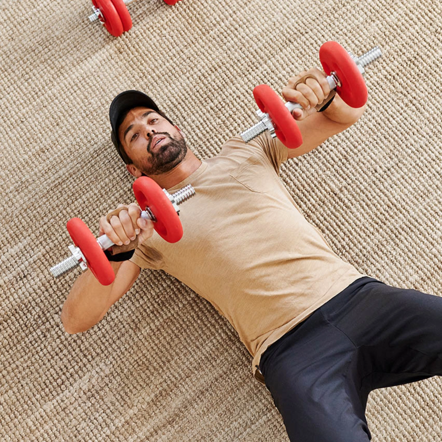 Man in gym holding basketball in his hands